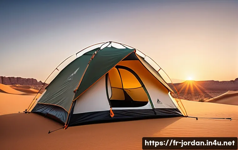 요르단 사막 캠핑 방법 - A lightweight, reinforced 3-season desert camping tent pitched in a sheltered rocky area of the Jord...